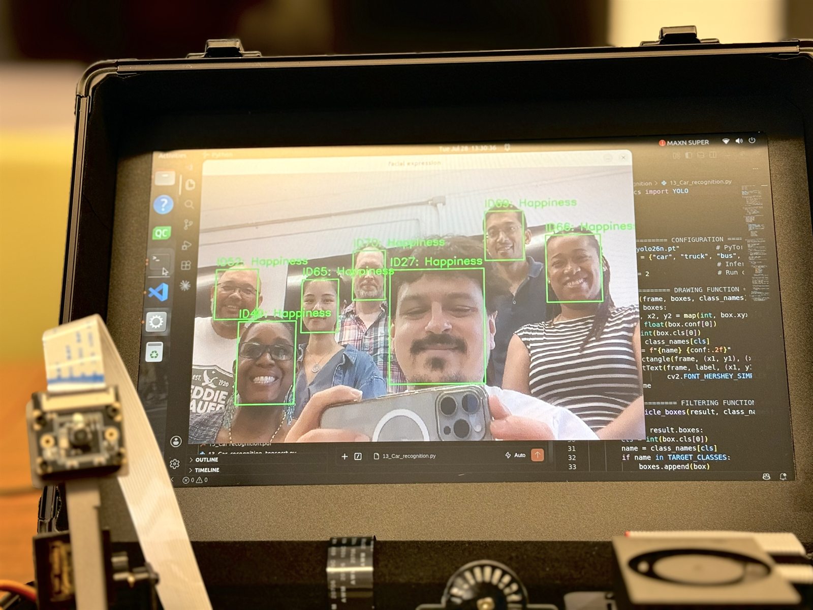 Live facial-expression computer vision demonstration running on the teaching kit